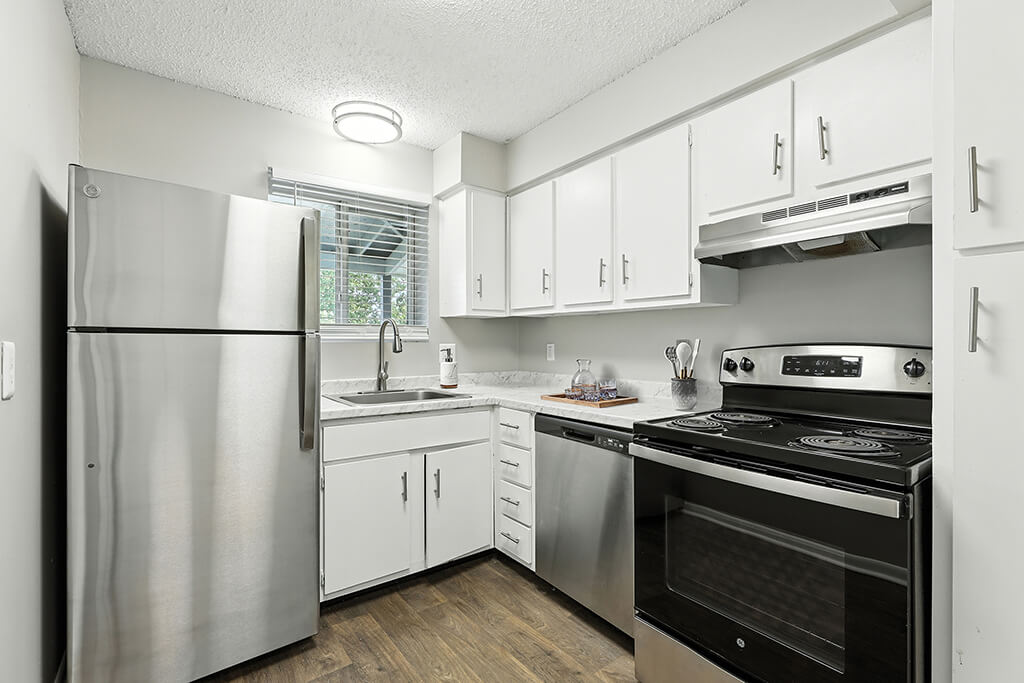 White kitchen cabinets at City Side Flats Apartments in Nashville TN